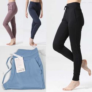 Calças casuais femininas para esportes de ioga, calças de corrida para exercícios, calças compridas para ginástica, calças de moletom grandes Wunder bolsos de trem