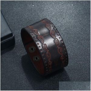 Bangle Retro Emboss Floral Leather Cuff Button Bracciale regolabile Wristand per uomo Donna Gioielli moda Drop Delivery Bracciali Dhnqc