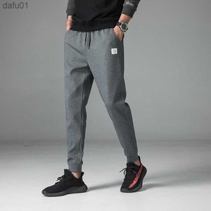 Mężczyźni dresowe bawełniane joggery męskie luźne swobodne spodnie ślady spodnie męskie spodnie sportowe dla mężczyzn Streetwear Pants Homme L230520