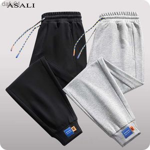 2022 Pantaloni casual da uomo Primavera Estate Pantaloni sportivi bianchi Pantaloni da jogging in cotone Pantaloni Harem Uomo Streetwear Pantaloni larghi tinta unita Uomo L230520