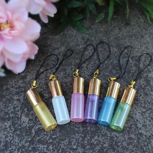 Koraliki 50pcs 3 ml 5 ml Mała szklana rolka na butelce Pusta butelki olejku eterycznego Doterra Władze Perfumy Fiolki z przejechaniem sieci kluczy