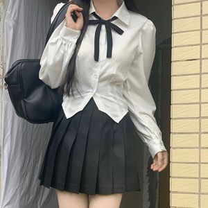 Abiti da lavoro Giappone Coreano Manica lunga JK Uniforme scolastica Camicetta con fiocco bianco Abito a vita alta Scozzese Gonne a pieghe Set Donna Studentessa Ragazza