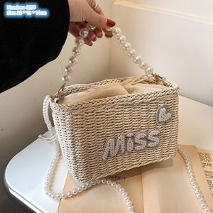 Factory sales shoulder bags 2 colors summer beach holiday stereotypes woven handbag sweet beaded chain bag small fresh Pearl beach mobile phone coin purse 465#