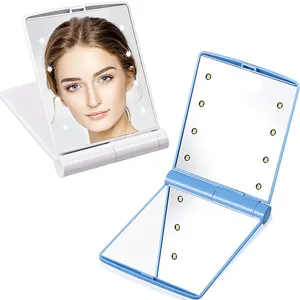 Mode vikbara kompakta speglar 8 LED -lampor smink spegel kosmetisk belysning mini bärbar presentficka speglar