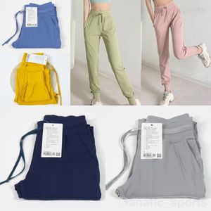 Lu Align Lu Mulheres Bolsos Calças Esportivas Soltas Yoga Calças de Moletom Atléticas Respiráveis Ao Ar Livre Calças Casual Jogging Calças Compridas Menina Roupas Esportivas Wunder Train