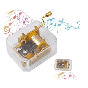 Novelty Items Arrival Unique Musical Box Acrylic Hand Crank Music Golden Movement Melody Castle In The Sky Creative Gift Drop Delive Dhikp