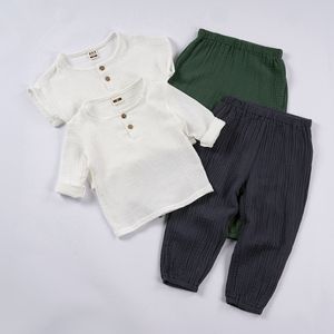 Kläder sätter 2st Muslin Organic Kids Outfits Cotton Solid Long Sleeve Tshirtpants Suits pojkar flickor Lossa barn kläder sommaren 230608