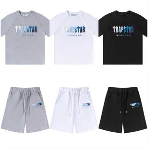 Sommarblå broderi mode casual lös rund nacke trapstar kort ärm t-shirt capris shorts mäns och kvinnors sport set kostym