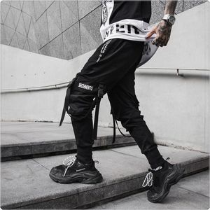 Pantaloni Streetwear Pantaloni Harem da uomo in cotone nero Hip Hop Pantaloni da jogging da uomo Pantaloni casual slim con tasche laterali Pantaloni sportivi primaverili Pantaloni cargo