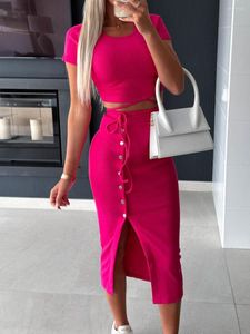 Tvådelt klänning ribbad stickad midi kjol 2 set kvinnor skörd topp bodycon split kjolar klippa ut avslappnade bitar outfit klänning (en rosa l)