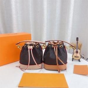 Mode nano bb super mini fatväska en neo stränghandtag paket kombination mönster av brun canvas kvinnlig designer lyxhandväskor söta vikta crossbody väska