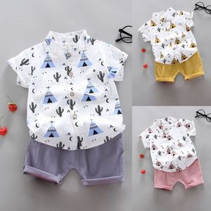 Kombinezon Summer Cute Cartoon Printing Solid Color Shorts Lapel Short Sleeve T Shirt Dwuczęściowy zestaw Baby Boys Firetrruck Ubrania 230608