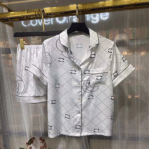 Pigiama estivo unisex camicia da notte in seta sottile a maniche corte abbigliamento casual per la casa set di pantaloncini a maniche corte in seta di ghiaccio sciolto