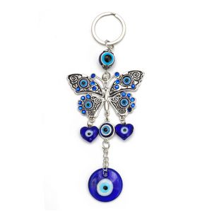 Creative Butterfly Devil's Eye Keychain Pendant Blue Evil Eye Bag Car Keychains smycken gåva för män kvinnor