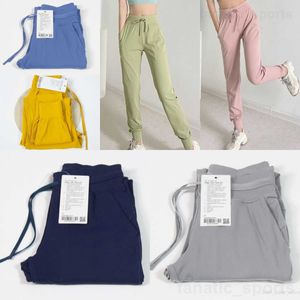 Bolsos femininos calças esportivas largas para ioga respirável ao ar livre calça casual jogging calças compridas menina roupas esportivas Wunder Train