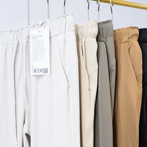 LL Abbigliamento da yoga Pantaloni casual da donna 78 a vita alta lu Allenamento da jogging Pantaloni sportivi da fitness a quattro lati in nylon ad alto rimbalzo Pantaloni da jogging