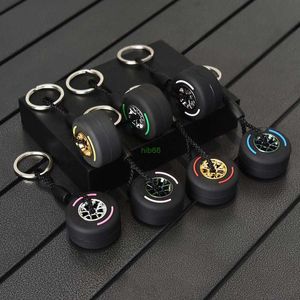 4OXN KeyChains Lanyards ny stil avtagbar nav däck nyckelring lyx unisex bil nyckelring mini f1 racing hjul däck nyckelchain bagage nyckel charm