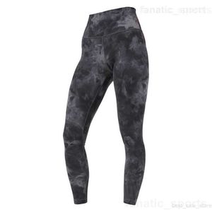 Calças compridas femininas para academia de ioga Calças compridas nuas para treinamento de ioga de cor sólida Calças de moletom para corrida apertadas para exercícios Leggings elásticas