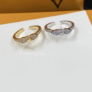 Designer de moda anel de trevo de quatro folhas cheio de diamantes mulheres homens ouro prata anel aberto amantes anel de compromisso de casamento Anel de noivado