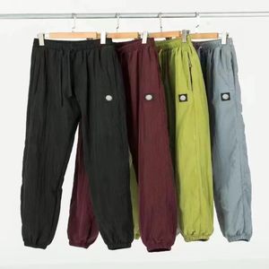 ST0NE 1SLAND Designer Lightning Pants resistentes a água Camisas pretas calças de pele com designer masculino de logotipo ao ar livre