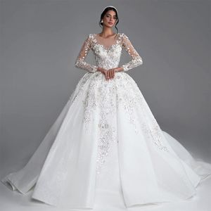 Luxurious Crystal 3D Flowers Lace Formal Princess Ball Gown Wedding Dress With Full Sleeve Sheer Neck Puffy Wedding Gown For Bridal Long Train
