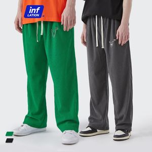 Hosen INFLATION Grüne vertikale Cordhose für Herren, solide Hose mit geradem Bein und Sternnadel 13103W21