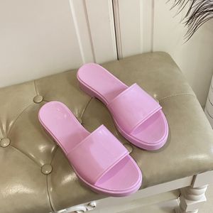 Pantofole firmate Nuove pantofole di gomma Sandali Pantofole da donna in gelatina Pantofole piatte Infradito Pantofole da spiaggia a righe alla moda da donna
