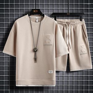 メンズトラックスーツTシャツショーツ2023夏のファッション男性セット2ピースブラックトラックスーツヒップホップストリートウェアランニングスポーツ特大5xl