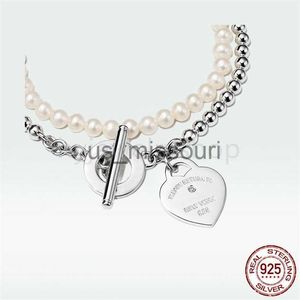 Pendant Necklaces T Designer heart pendant tag pearl Necklace bracelet diamond stud earrings Women Luxury Brand Jewelry Classic Fashion 925 sterlling s J230612