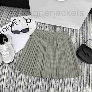 Skirts Designer 23 Summer New Academic Style Leisure Triumphal Arch Houndstooth Press Fold Drawstring Elastic Waist Short Skirt QYXV