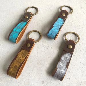 Anahtarlıklar Graffiti Art Boya Orijinal Cowhide Deri Anahtar Yüzükler Vintage Erkek Kadın Araba Kayış Bel Bel Cüzdan Ringkeychains