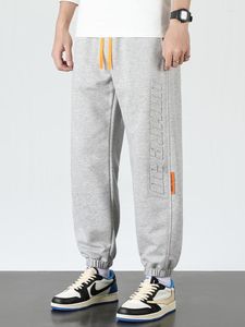 Męskie spodnie 2023 Autumn Męskie spodnie dresowe workowate joggery mody list Hip Hop Streetwear plus luźne bawełniane harem 6xl