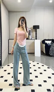 Jeans casual da donna Pantaloni slim con logo Bottone con cerniera Decorazione Comodi pantaloni traspiranti Abbigliamento outdoor Jeans da donna di alta qualità K2