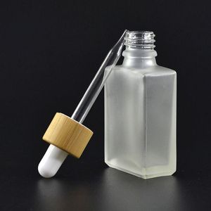 Flaconi contagocce in vetro trasparente/smerigliato da 30 ml Pipetta di reagente liquido Bottiglie di profumo di olio essenziale quadrato Bottiglie di olio di fumo e liquido Bambù Vsmq