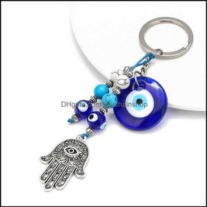 Kleryki Akcesoria mody 2021 Turkish Evil Eye Lucky Blue Fatima Hand Charm Trinket Łańcuch kluczowy Klapa Vintage dla mężczyzn Kobiety C210Q