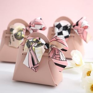 Confezione regalo 10pz Scatola in pelle a forma di borsa Fiocco in nastro con confezione di sacchetti di caramelle a mano Bomboniera per feste di nozze Fornitura per baby shower