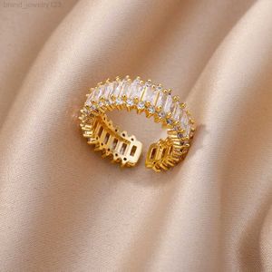 Mode lyxig zirkon charm baguette kubik zirkoniumbröllopsringar för kvinnor guldfärg öppen finger ring fest smycken gåva