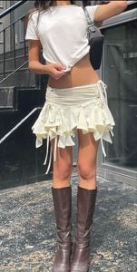 Spódnice seksowne kobiety gotycka punkowa nieregularna solidna kolor sznurka rucha ruffles mini spódnica letnia moda krótka 230612