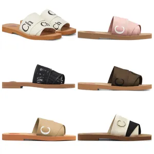 Designer-Sandalen für Damen, Luxus-Slipper, Woody für Mules, flache Slides, Hellbraun, Beige, Weiß, Schwarz, Rosa, Schriftzug, Stoff-Canvas-Hausschuhe, Damen-Kreuz-Sommersandalen