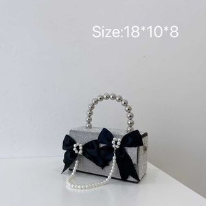 Women's 2023 New Korean Net Red Contrast Bow Knot Pearl Chain Rhinestone Handheld One Shoulder Crossbody Bag 230613