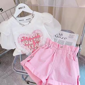 Zestawy odzieży detaliczne dziewczynki nastolatki Korea Summer Różowe zestawy T-shirt szorty mody Girl 4-9 t 230613