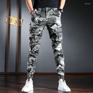 Calças masculinas primavera close-up camuflagem leggings macacão masculino versão coreana tendência emagrecimento casual masculino masculino cargo