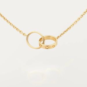 Collana di design di lusso Ciondolo di design classico di alta edizione Collana d'amore per donne Ragazze Ciondoli a doppio anello Collare per gioielli da sposa in acciaio al titanio