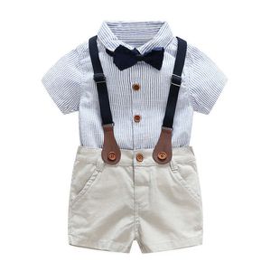 Estate 2023 Nuova camicia a maniche corte Pantaloni con cinturino Set da ragazzo Abbigliamento per bambini coreano Abbigliamento per bambini