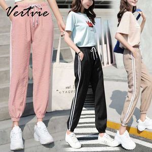 Leggings femininas leggings laterais listradas calças de moletom femininas calças finas casuais calças Harlan versáteis calças retas modernas calças até o tornozelo