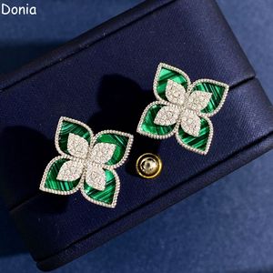 Donia Jewelry Luxury Earringsヨーロッパとアメリカンファッションフラワーズチタンマイクロインレイドジルコンシェルデザイナーシルバーニードルスタッド。