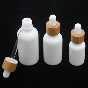 Frasco de vidro branco opala 15ml 30ml 50ml com conta-gotas de bambu 1 OZ frascos de óleo essencial de madeira porcelana bivre