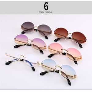 Nya ovala solglasögon för kvinnor Rimless Diamond Cutting Lens Sun Glasses Female Ocean Clear Purple Lenses Lentes de Sol2537092281C