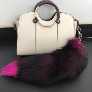 Rose Redreal äkta Red Fox Fur Tail Keychians Plush Pom Poms Cosplay Toy Keyrings Car Keychain Bag Charm Tassels5653165239G