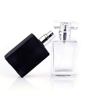 Partihandel varm 30 ml bärbar transparent svart glas parfymsprayflaskor med aluminiumatomizer tomma kosmetiska behållare asqig